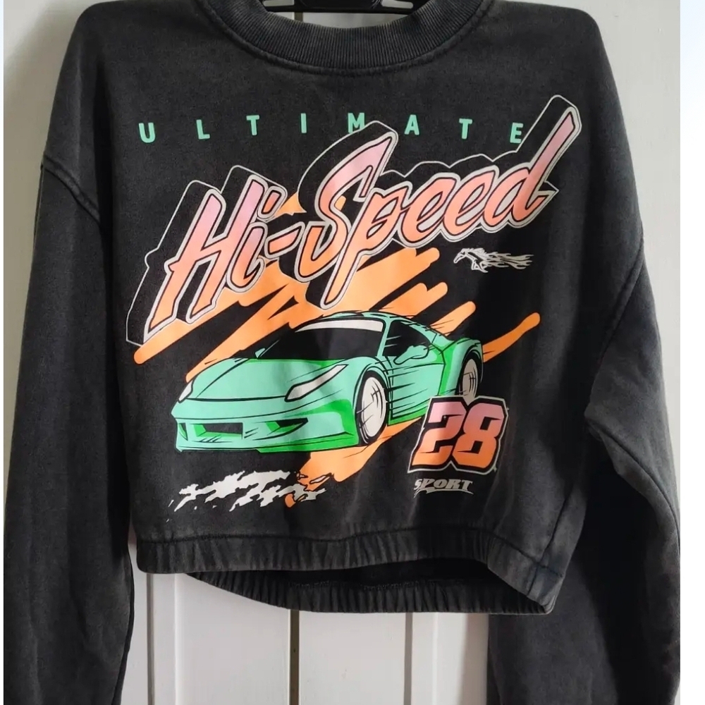 H&M Black Graphic Sweatshirt with Green and Orange Accents